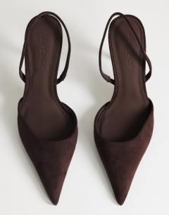 Model wearing Angel faux suede high heeled court shoe in chocolate