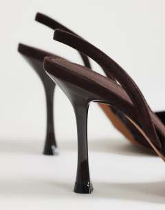 Model wearing Angel faux suede high heeled court shoe in chocolate