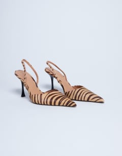 Model wearing Angel heeled court shoe in tiger print hair on real leather 