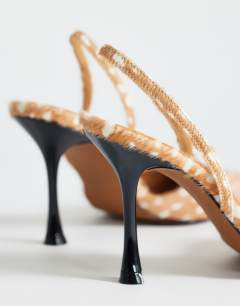 Model wearing Angel real hair on leather court shoe in deer print