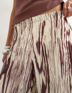 Model wearing Animal crinkle wide leg trouser in brown