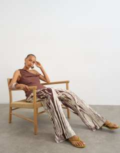 Model wearing Animal crinkle wide leg trouser in brown