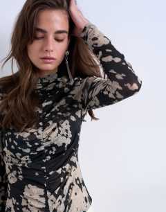 Model wearing Animal mono spot print ruched long sleeve top in black
