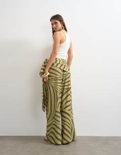 Model wearing Animal plisse wrap scarf detail trousers in green