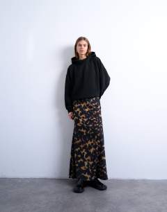 Model wearing Animal print mesh maxi skirt in multi
