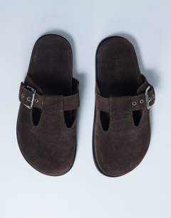Model wearing Annie real leather buckle clog in chocolate