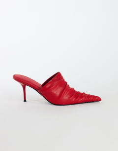 Model wearing Ansel ruched pointed mid heel court shoe in red