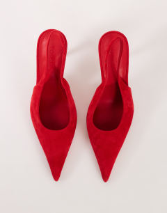Model wearing Anya real suede sling back heeled court shoe in red
