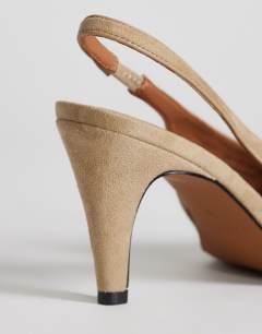 Model wearing Arabella cone heel sling back high court shoe in taupe