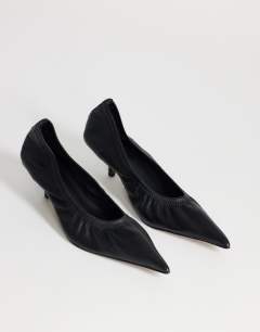 Model wearing Arizona real leather ruched kitten heel court in black