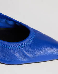 Model wearing Arizona real leather ruched kitten heel court in cobalt