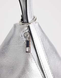 Model wearing Arthur multi wear bag in silver