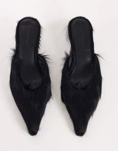 Model wearing Asher kitten heel court in black hair on real leather 