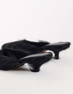 Model wearing Asher kitten heel court in black hair on real leather 