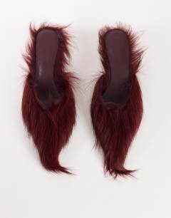 Model wearing Asher kitten heel court in red hair on real leather