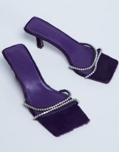 Model wearing Astrid diamante heeled mule in purple real leather pony