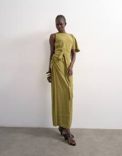 Model wearing Asym sleeve tie waist cupro maxi dress in khaki