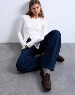 Asymmetric button through long sleeve top in ivory