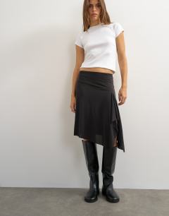 Model wearing Asymmetric cupro soft midi skirt in black