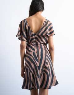 Model wearing Asymmetric frill mini dress in abstract choc stripe