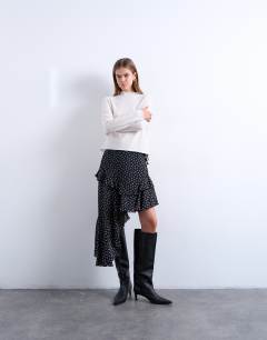 Asymmetric hem frill detail midi skirt in black and white polka dot