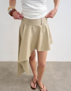 Model wearing Asymmetric mini skirt in stone