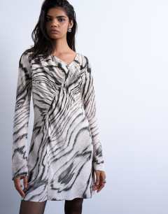 Model wearing Asymmetric mini tea dress in mono abstract print