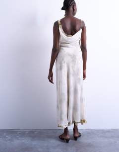 Model wearing Asymmetric neckline double layered maxi dress in painterly floral