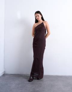 Model wearing Asymmetric one shoulder 3D flower midi dress in chocolate