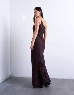 Model wearing Asymmetric one shoulder 3D flower midi dress in chocolate