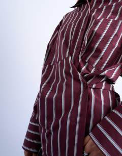 Model wearing Asymmetric placket waisted long sleeve shirt in white