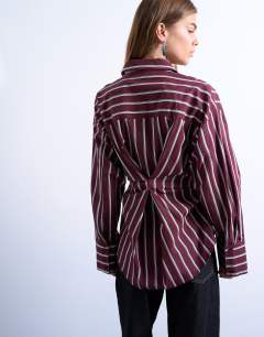 Model wearing Asymmetric placket waisted long sleeve shirt in white