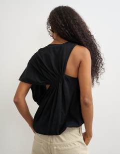 Model wearing Asymmetric ruched back tee in black