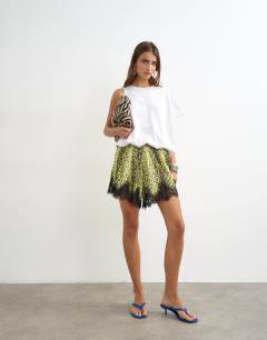 Model wearing Asymmetric ruched back tee in white
