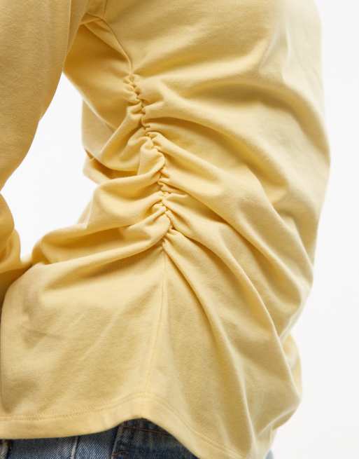 Topshop asymmetric slash neck long sleeve top in yellow