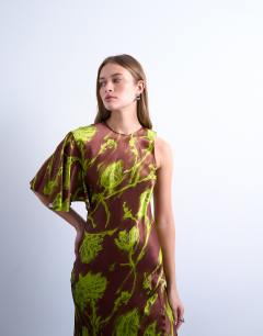 Model wearing Asymmetric sleeve full hem occasion midi dress in green blurred rose