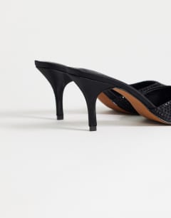 Model wearing Avery embellished pointed mule mid court in black