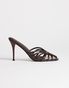 Model wearing Azelia heeled sandal in dark chocolate