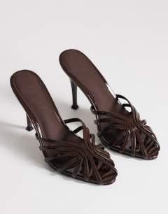 Model wearing Azelia heeled sandal in dark chocolate
