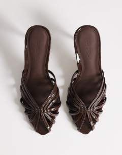 Model wearing Azelia heeled sandal in dark chocolate