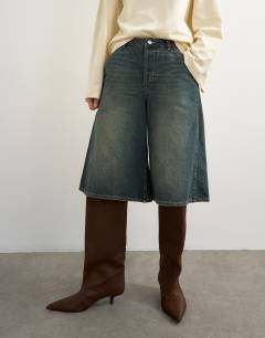 Model wearing Baggy low rise urban culotte in dirty blue