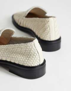 Model wearing Bali leather weave flat shoe loafer in off white 