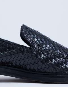 Model wearing Bali real leather weave flat shoe loafer in black