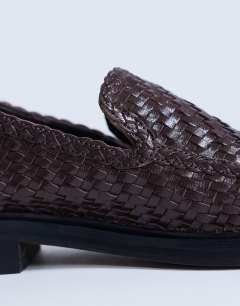 Model wearing Bali real leather weave flat shoe loafer in chocolate