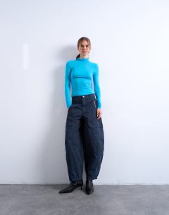 Model wearing Balloon cargo trouser with zip and pocket details in charcoal