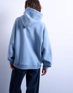 Model wearing Balloon sleeve hoodie in blue