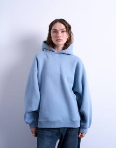 Model wearing Balloon sleeve hoodie in blue