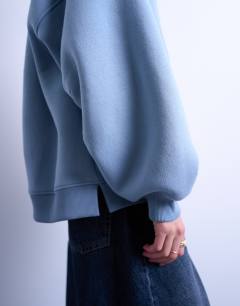 Model wearing Balloon sleeve hoodie in blue