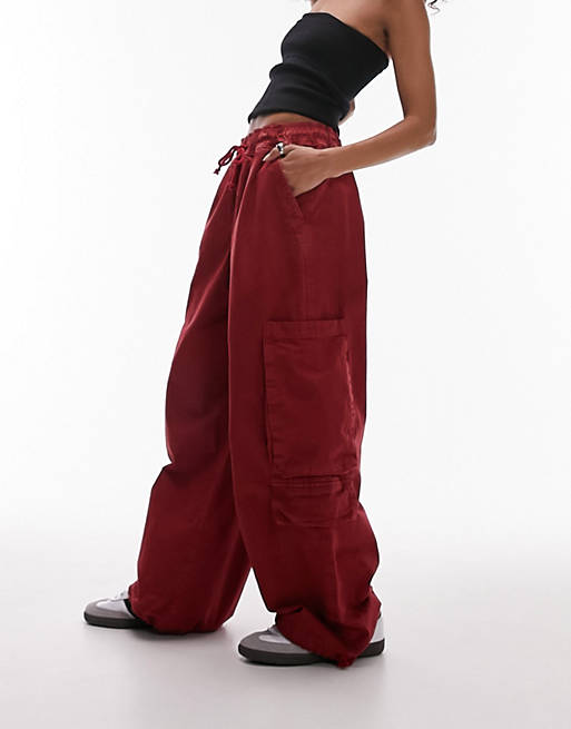 Topshop balloon washed pull on pocket cargo trouser in red | ASOS