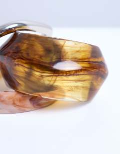 Model wearing Bari 3 pack bangles in silver, snake & wood